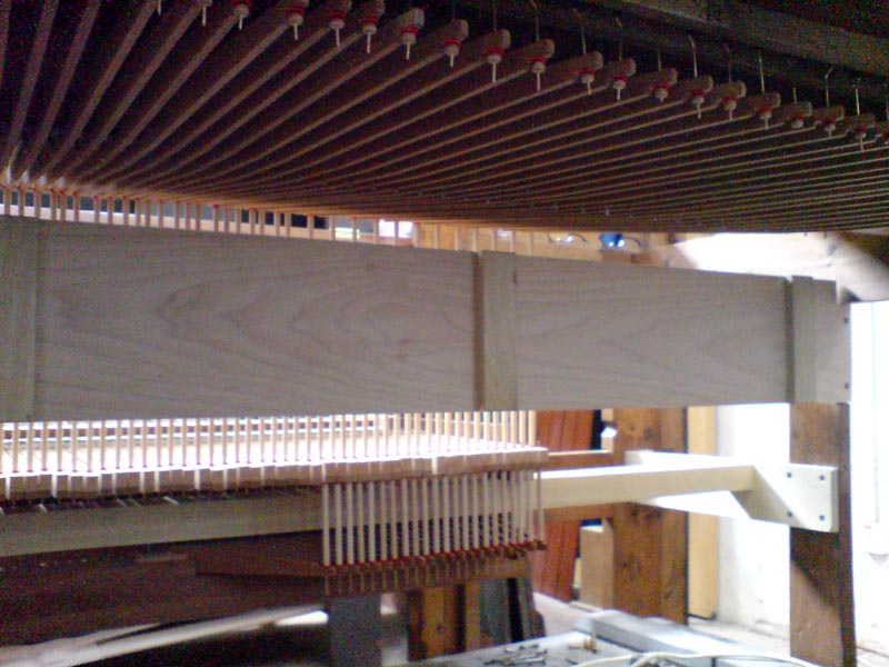 back of rollerboard with new manual backfall beam at top & pedal action below