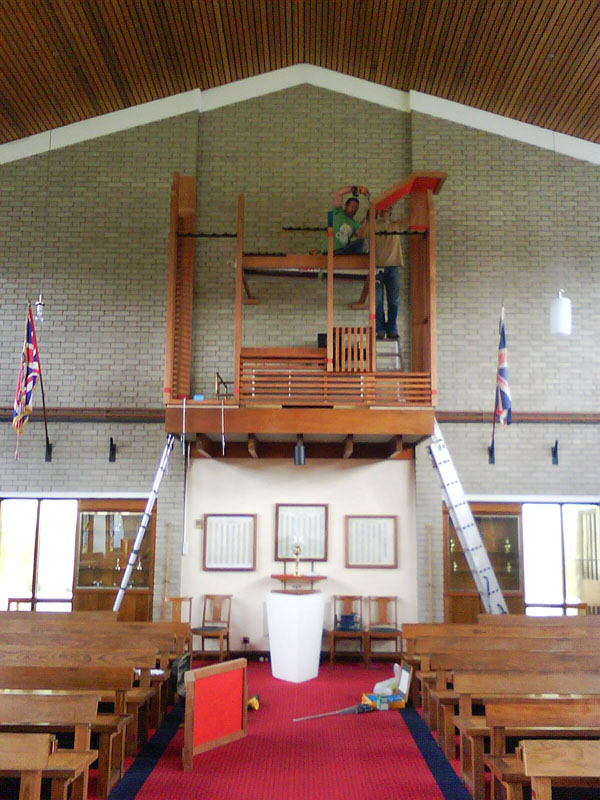 New organ case being erected