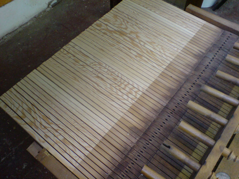 original keyboard now extended for mechanical action (had previously been cut short to fit electric contacts)