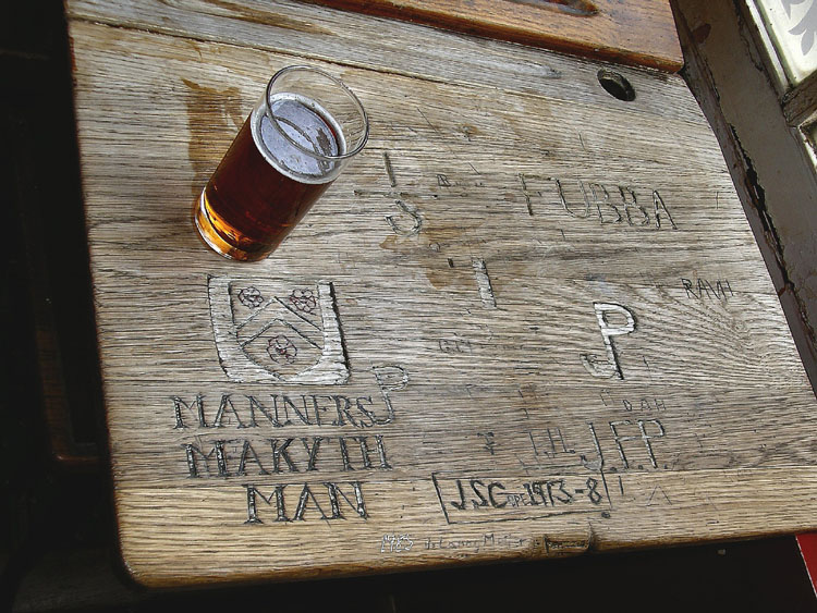 A Winchester College desk in the Wykeham Arms