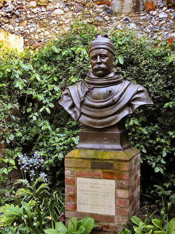 Statue of William Walker, diver, at Winchester Cathedral